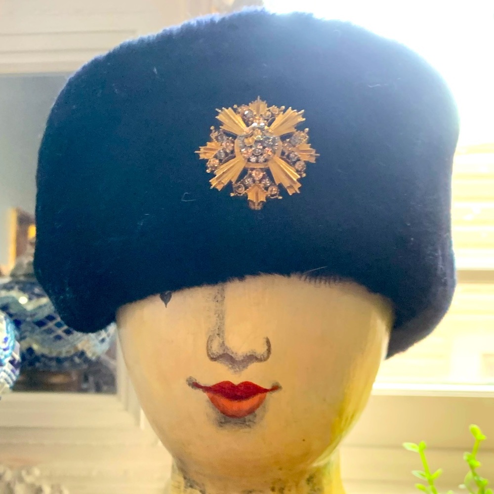 Vintage faux fur hat with vintage Unser rhinestone broach